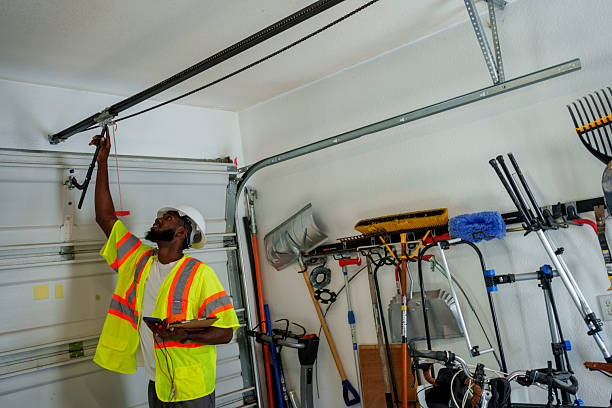 Professional Garage Door Panel Replacement technician working in Clarendon, AR